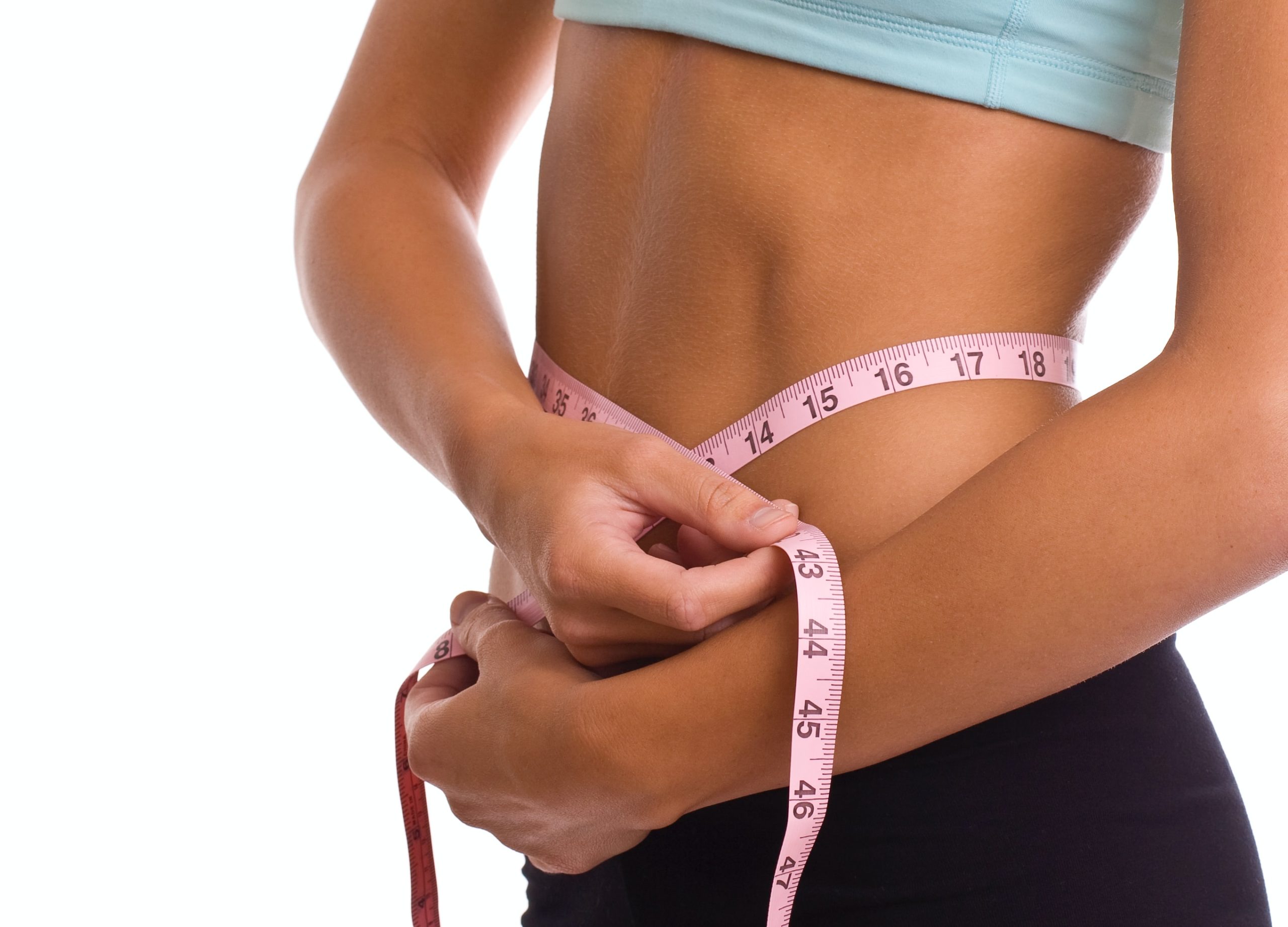 a woman measuring her BMI